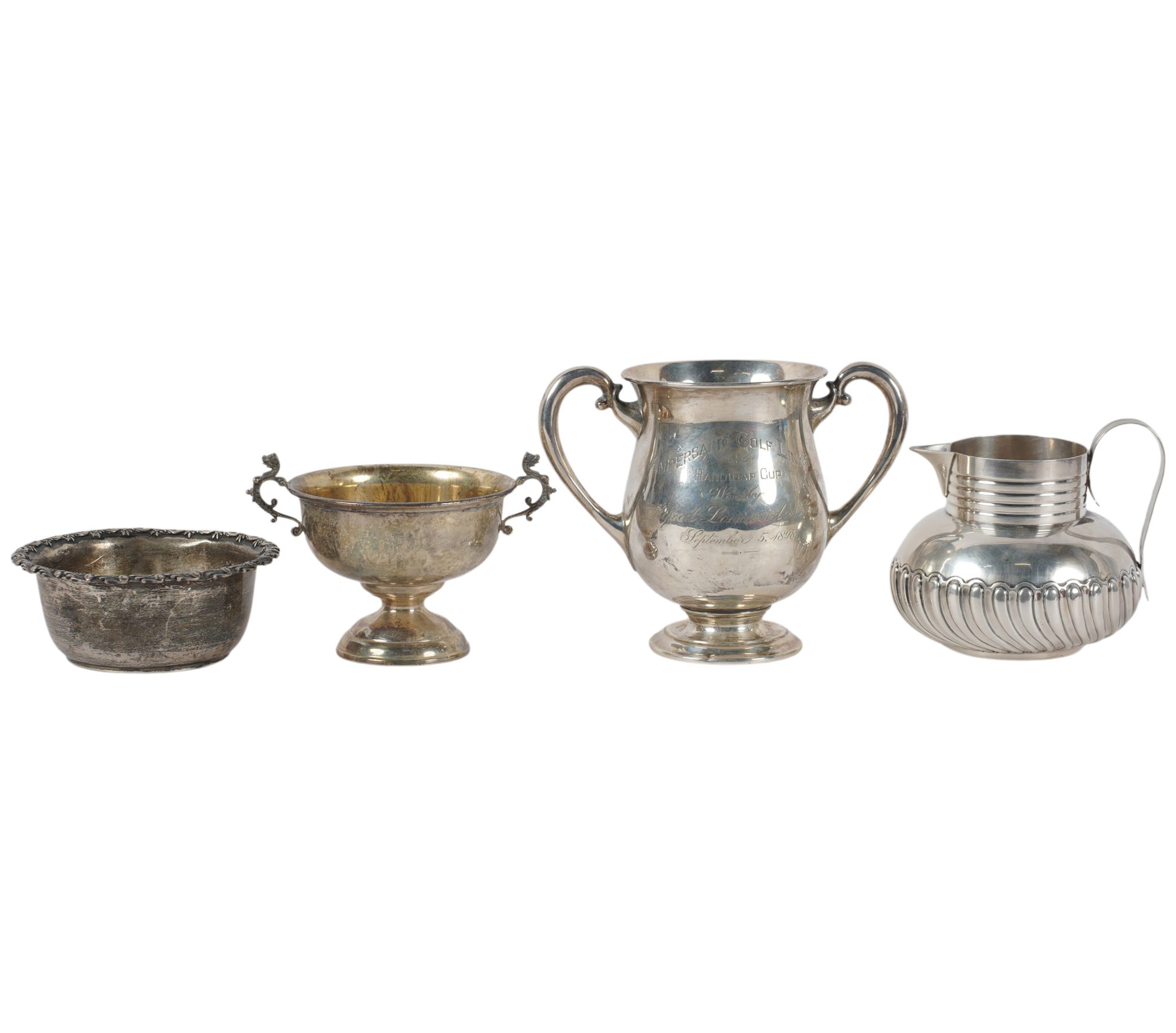 Four Sterling Silver Vessels