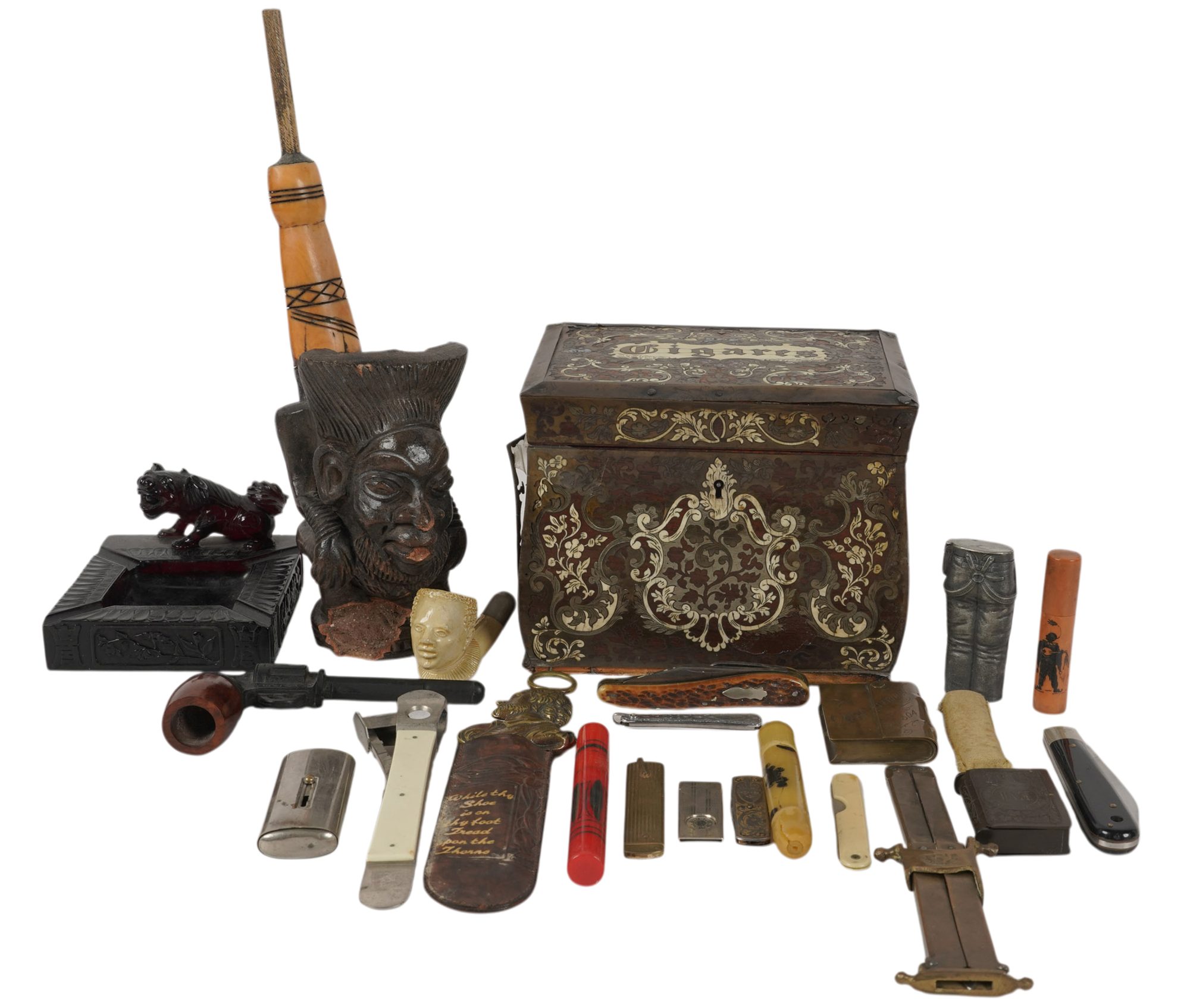 A Collection of Smoking Accessories and Knives