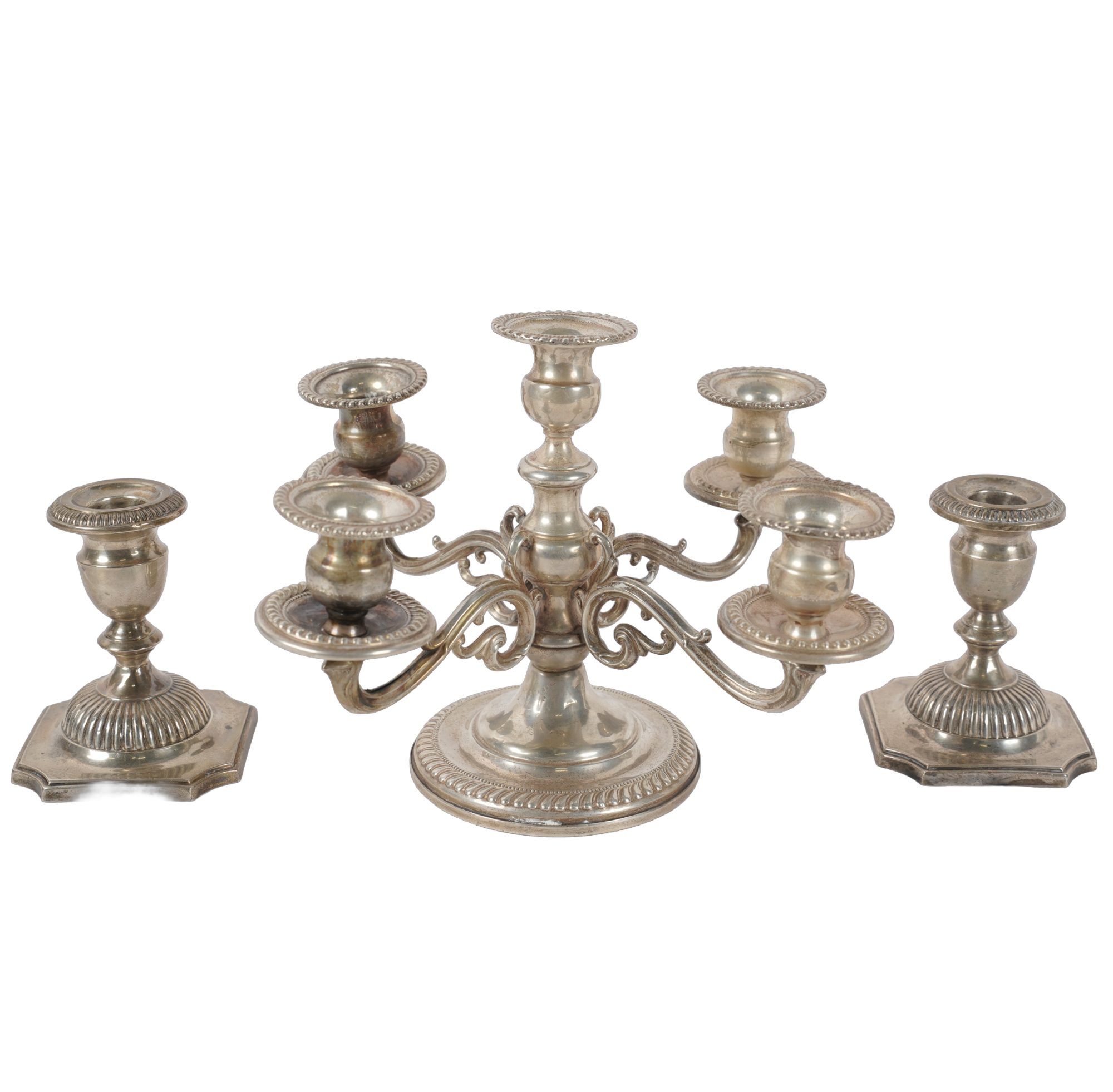 A Group of Three Sterling Weighted Candle Holders