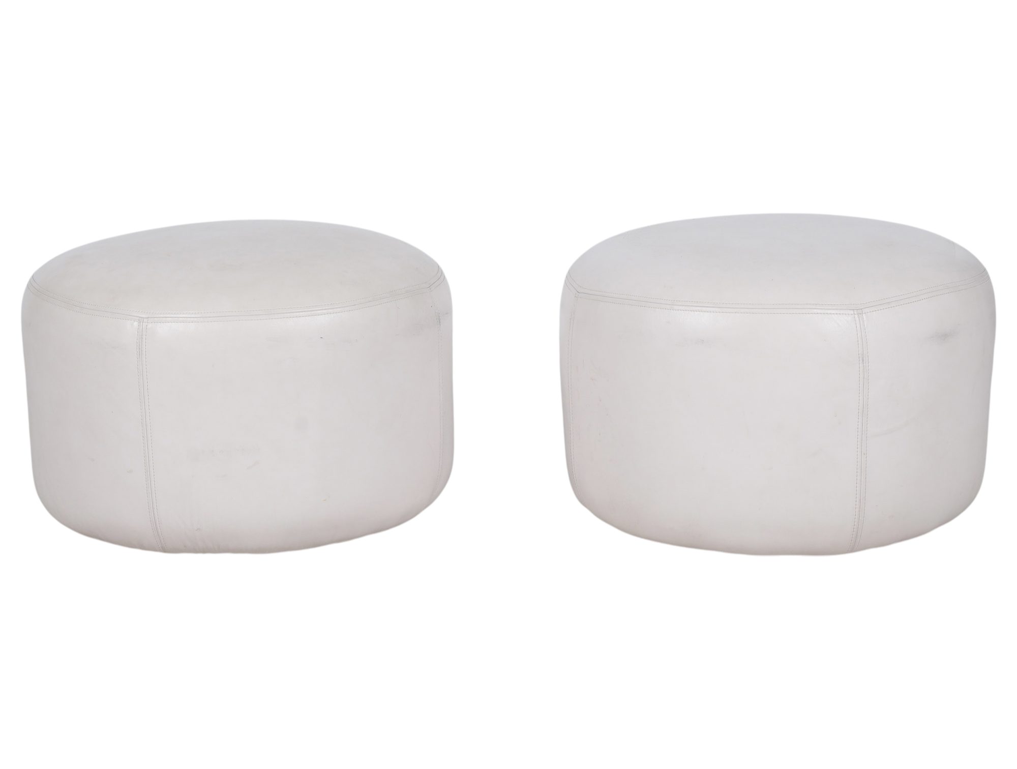 Two Round Leather Upholstered Ottomans