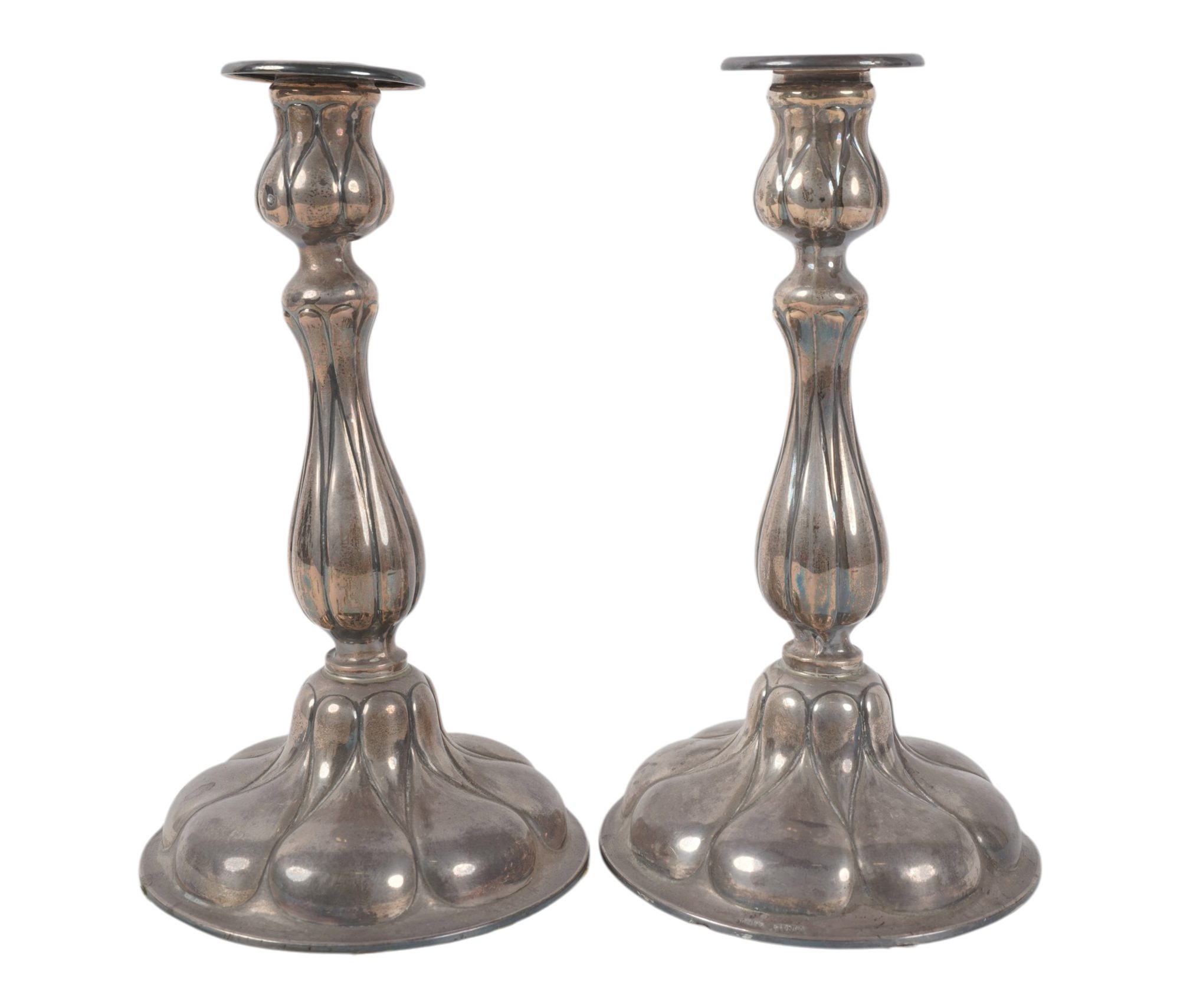 A Pair of Weighted Sterling Silver Candle Sticks