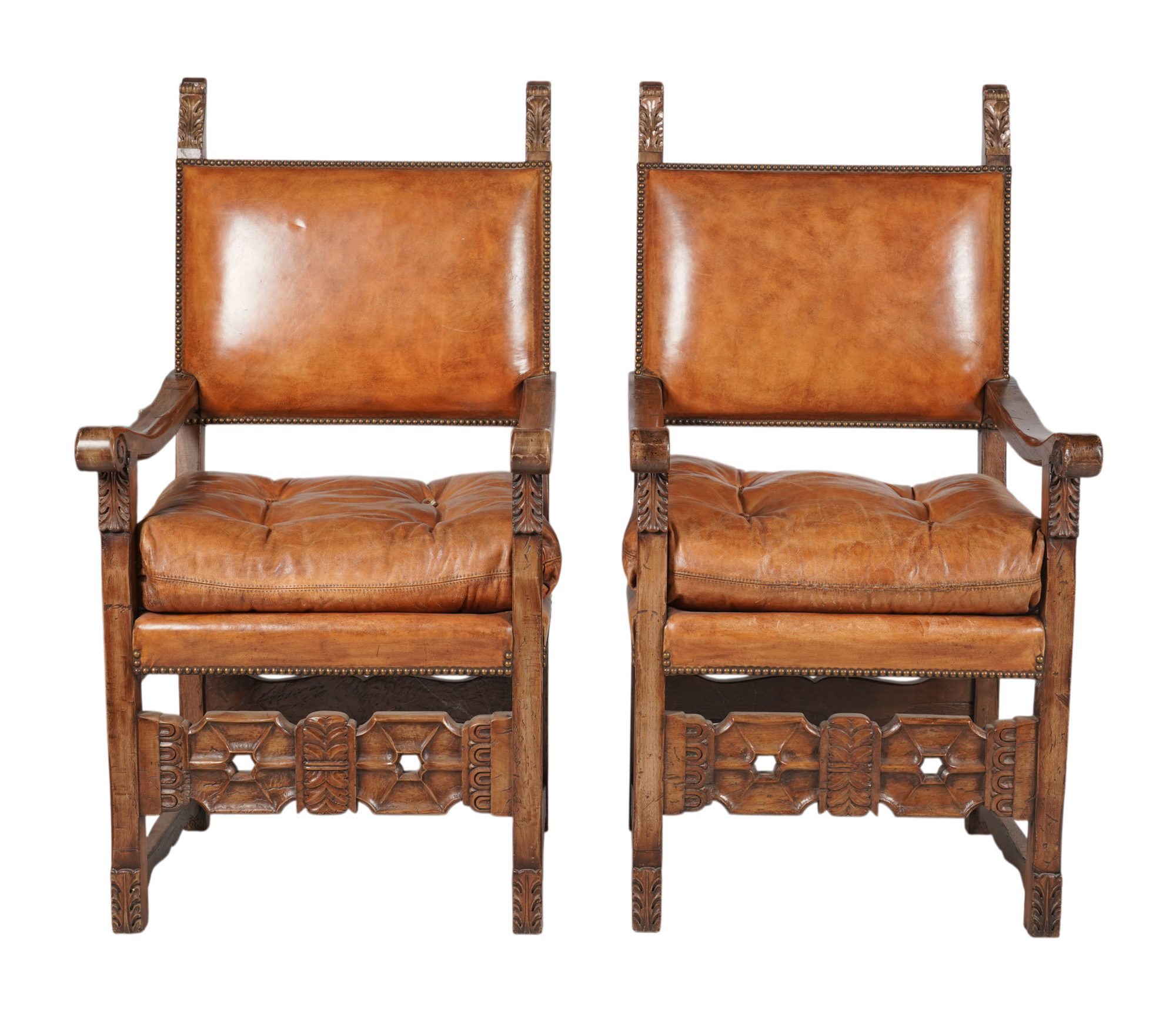 A Pair of Spanish style Walnut and Leather Hall Chairs