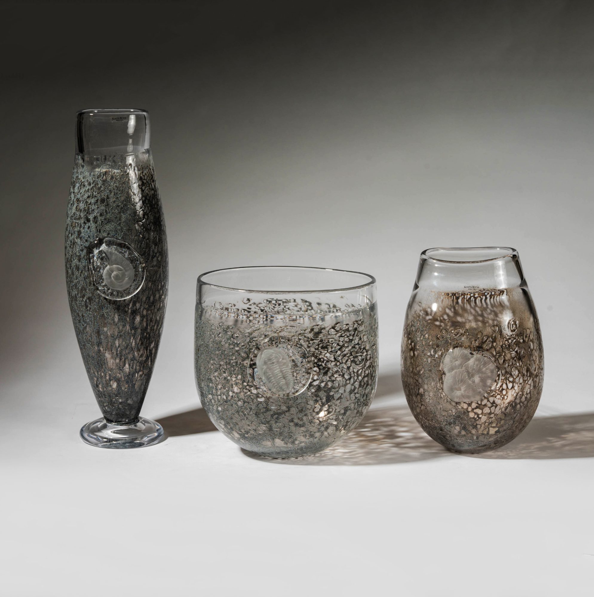 Kjell Engman for Kosta Boda, Three Fossil Art Glass Vases