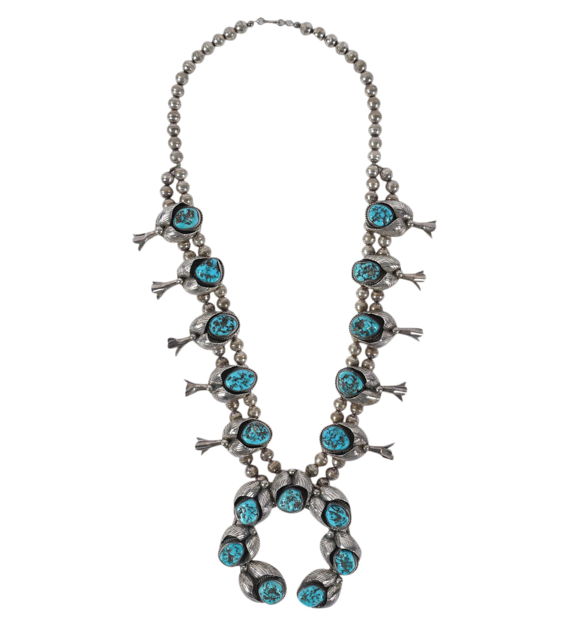 A Navajo Sterling Silver and Turquoise Squash Blossom Necklace