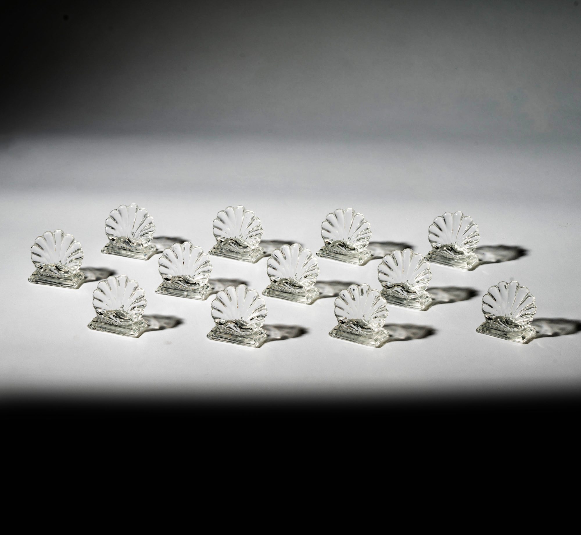A Set of Twelve Baccarat Shell Placecard Holders