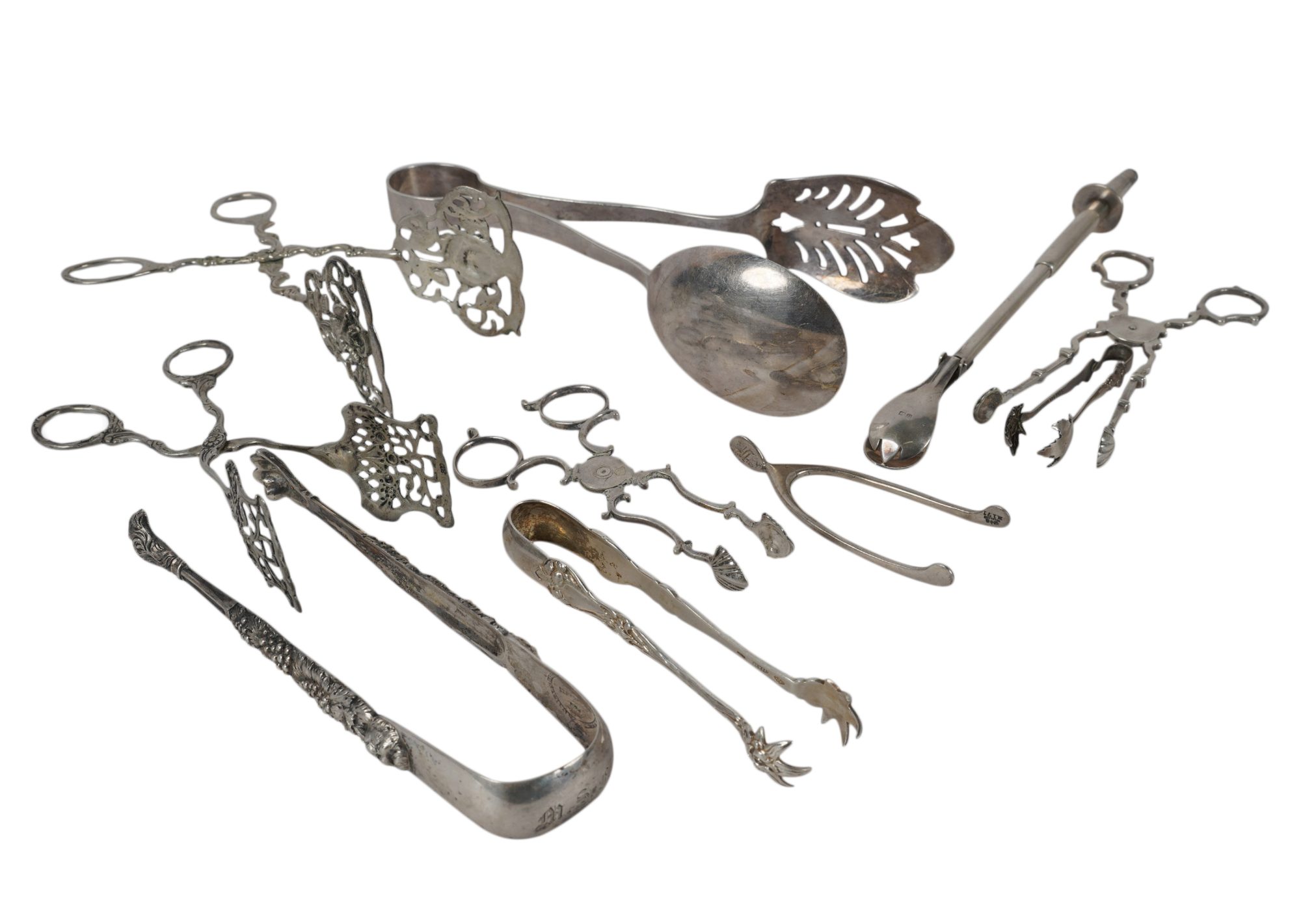 A Collection of Sterling and .800 Silver Tongs