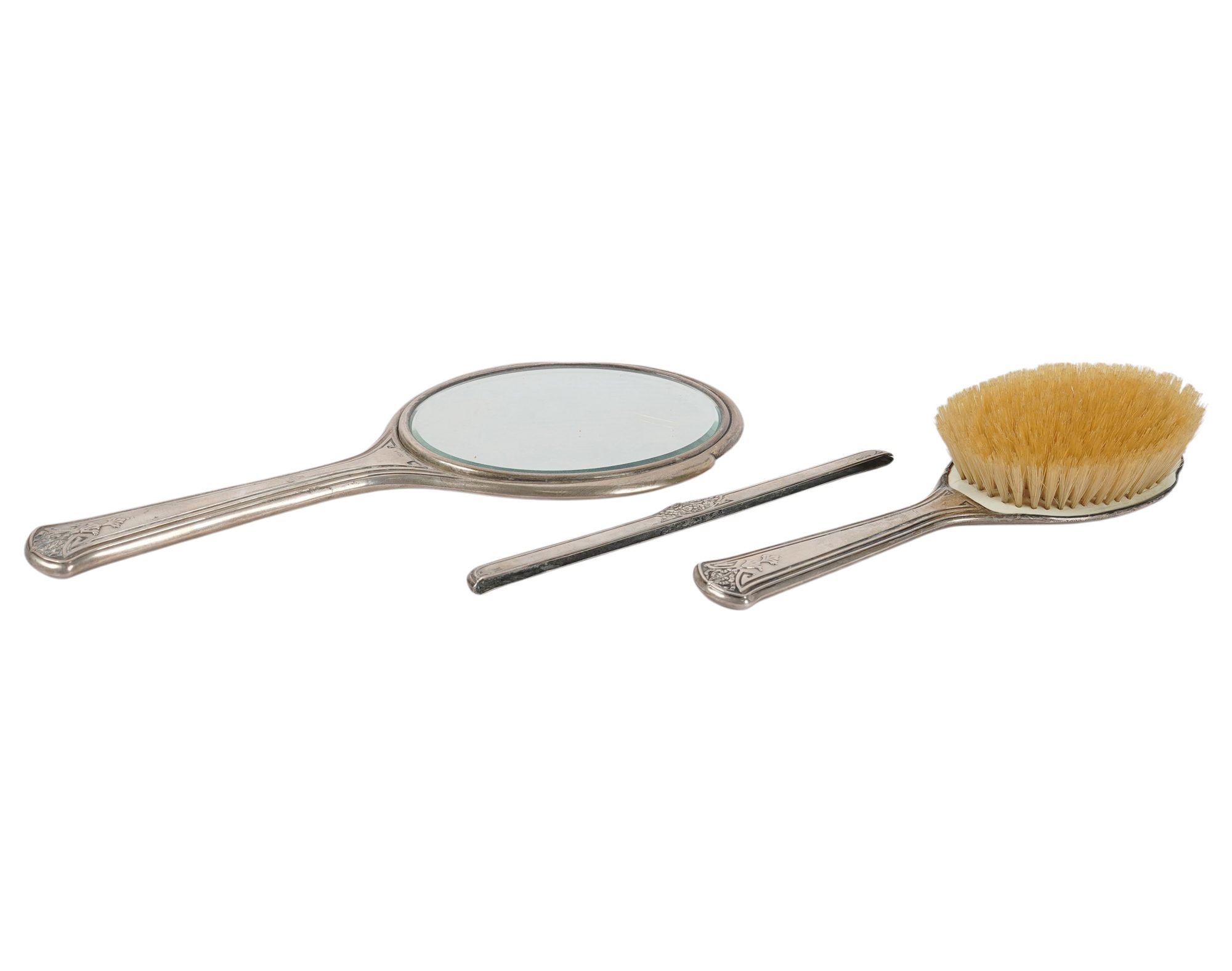 A Sterling Three Piece French Style Dresser Set