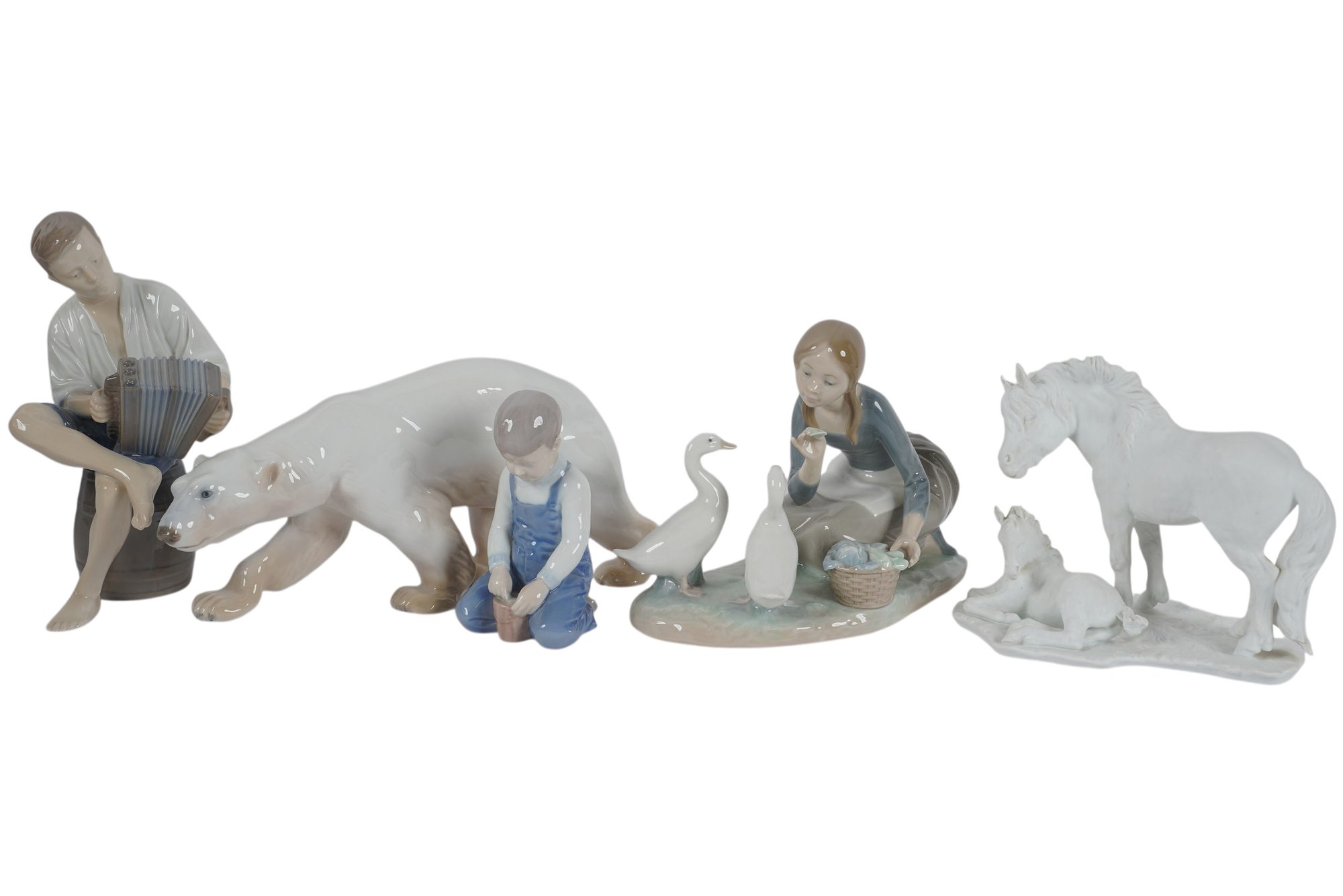 A Collection of Designer Porcelain Figurines