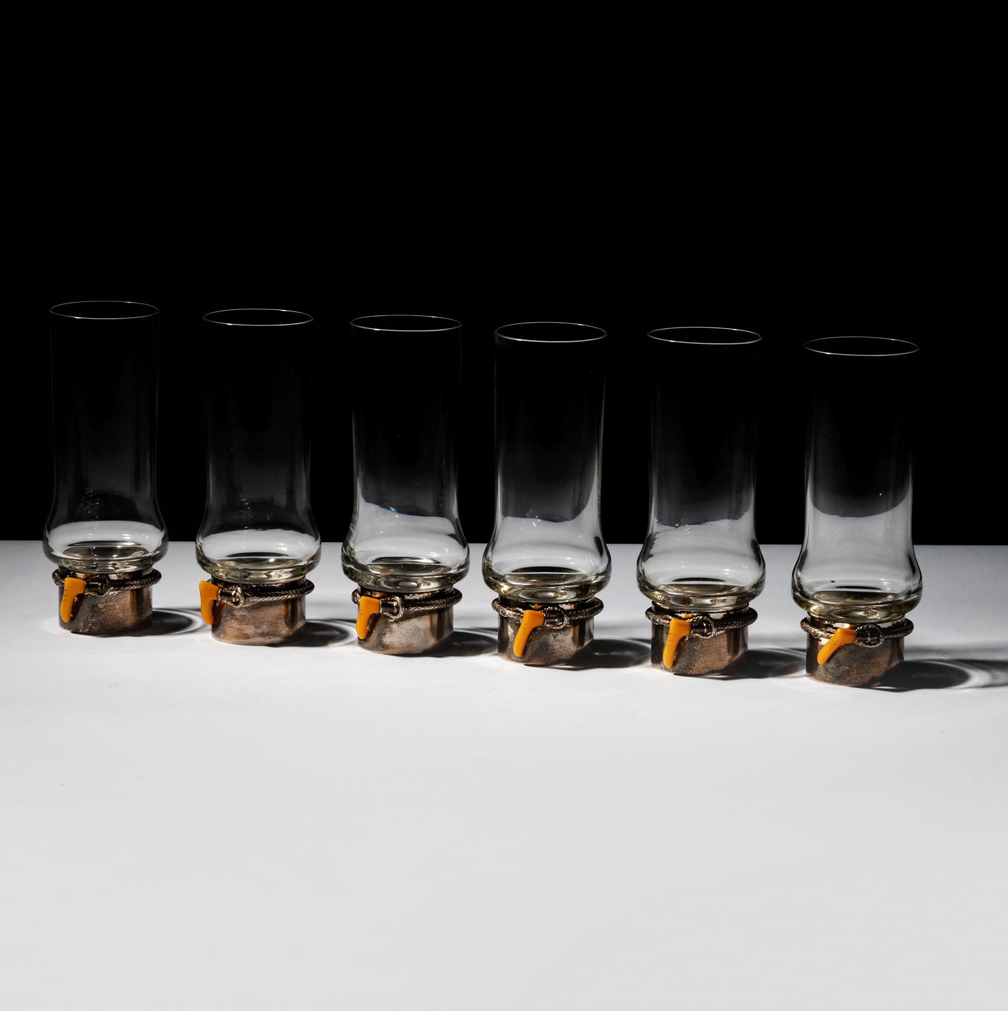 A Set of Six Gucci Tumblers