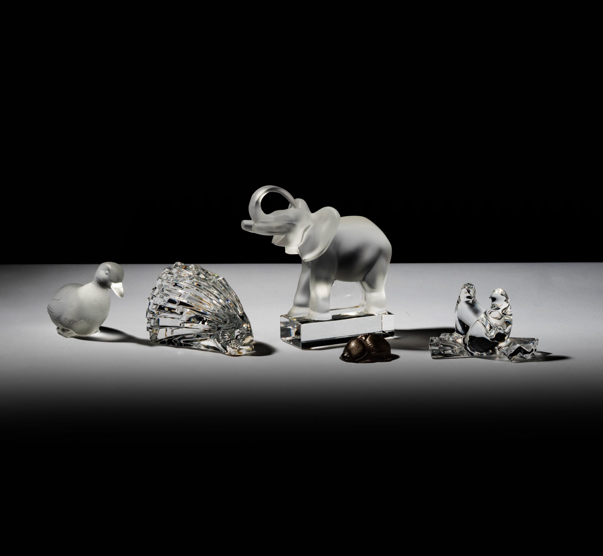A Collection of Lalique and Baccarat Figurines