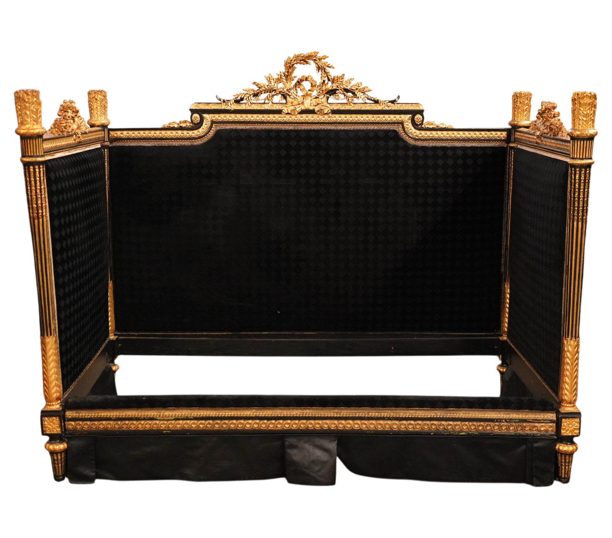 A French Empire style Ebony and Parcel Gilt Daybed