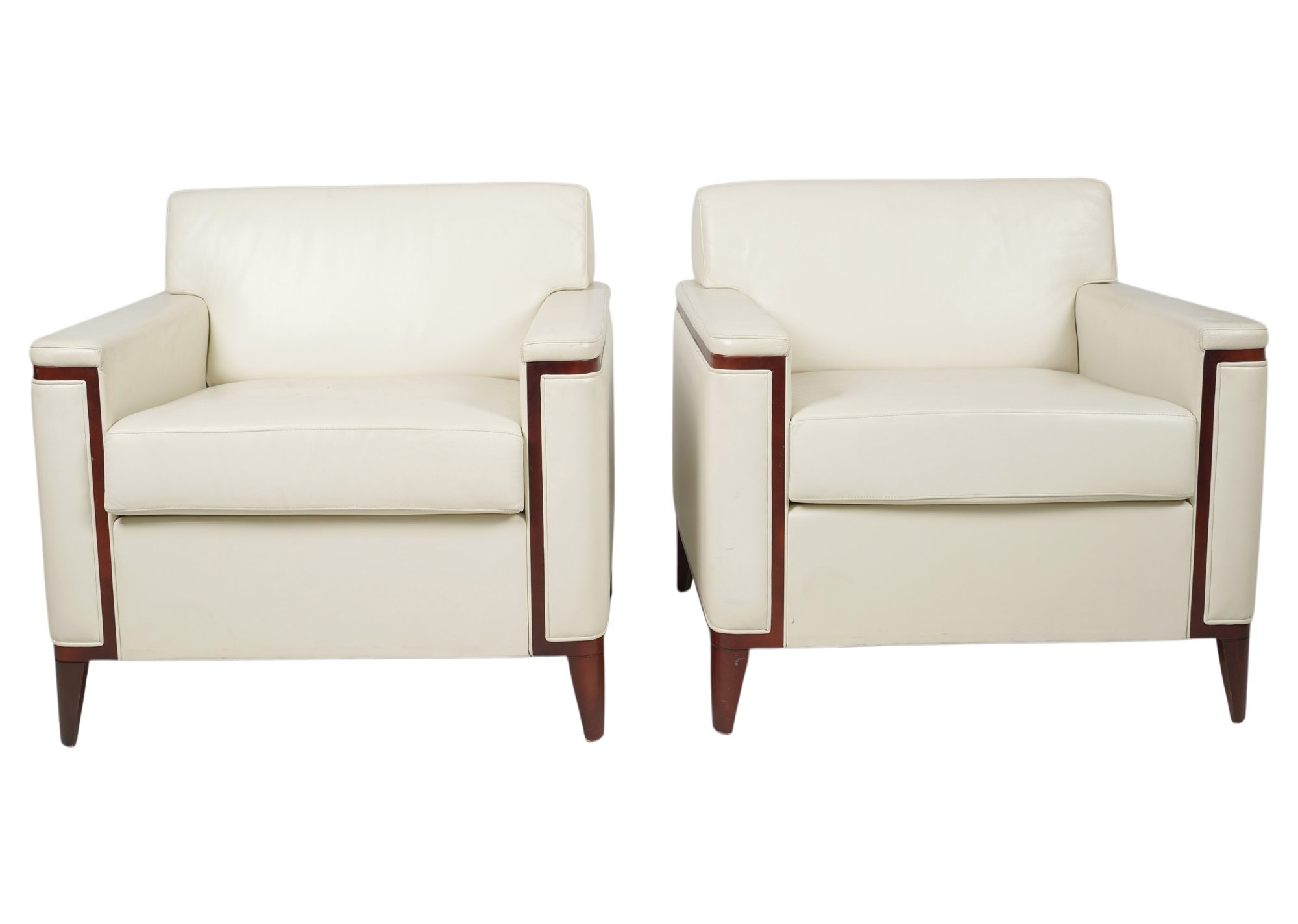 Four White Barrel Leather Club Chairs