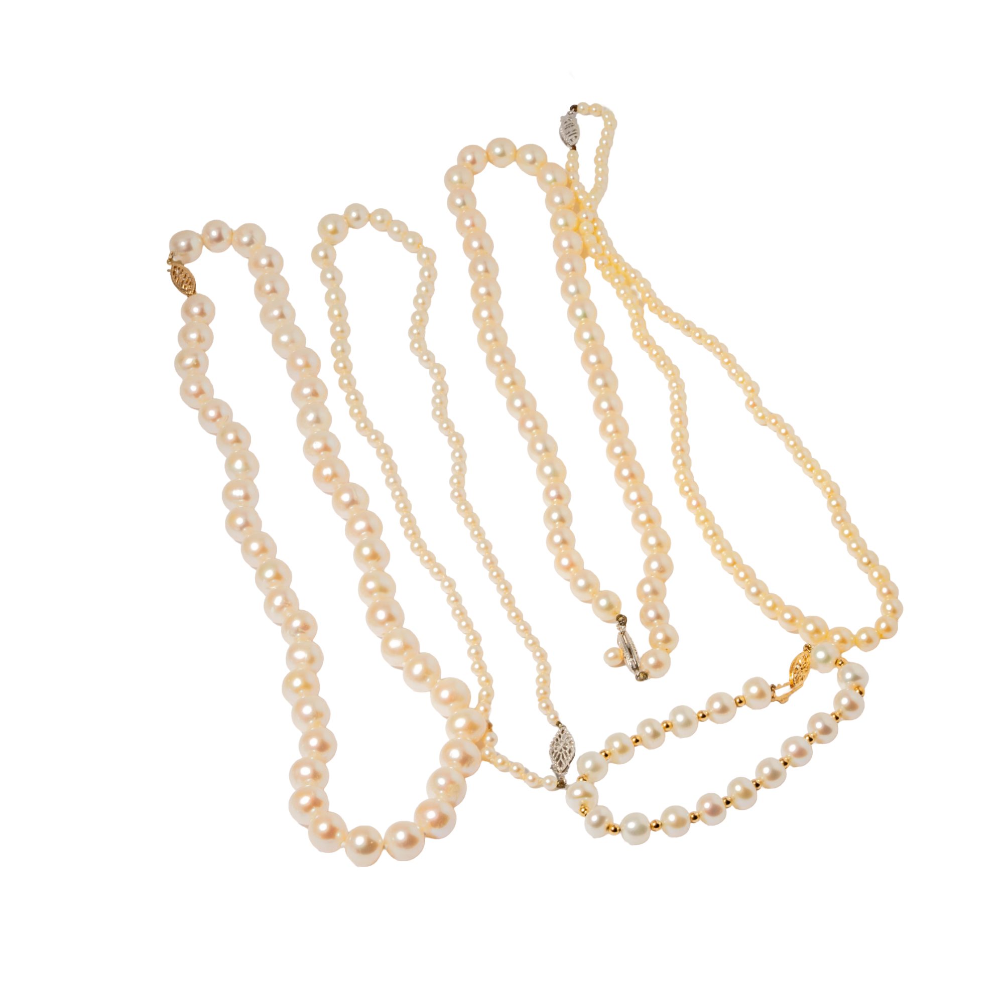 Group of Four Gold and Pearl Necklaces with a Pearl Bracelet