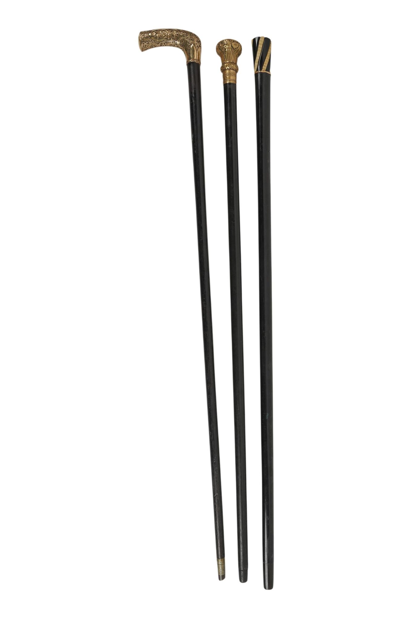A Collection of Gold and Gold-Filled Walking Sticks