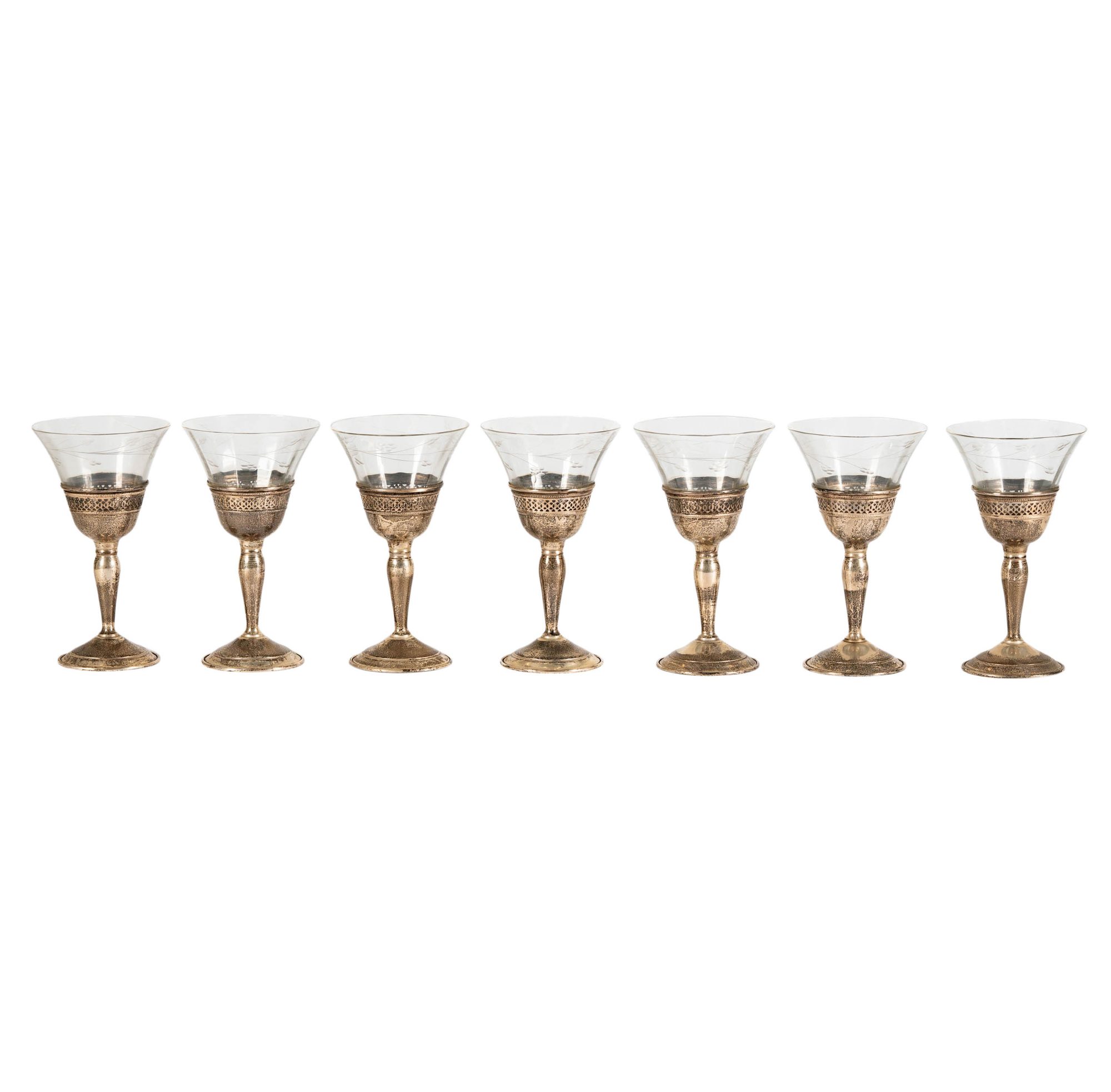 Seven Sterling and Glass Goblets
