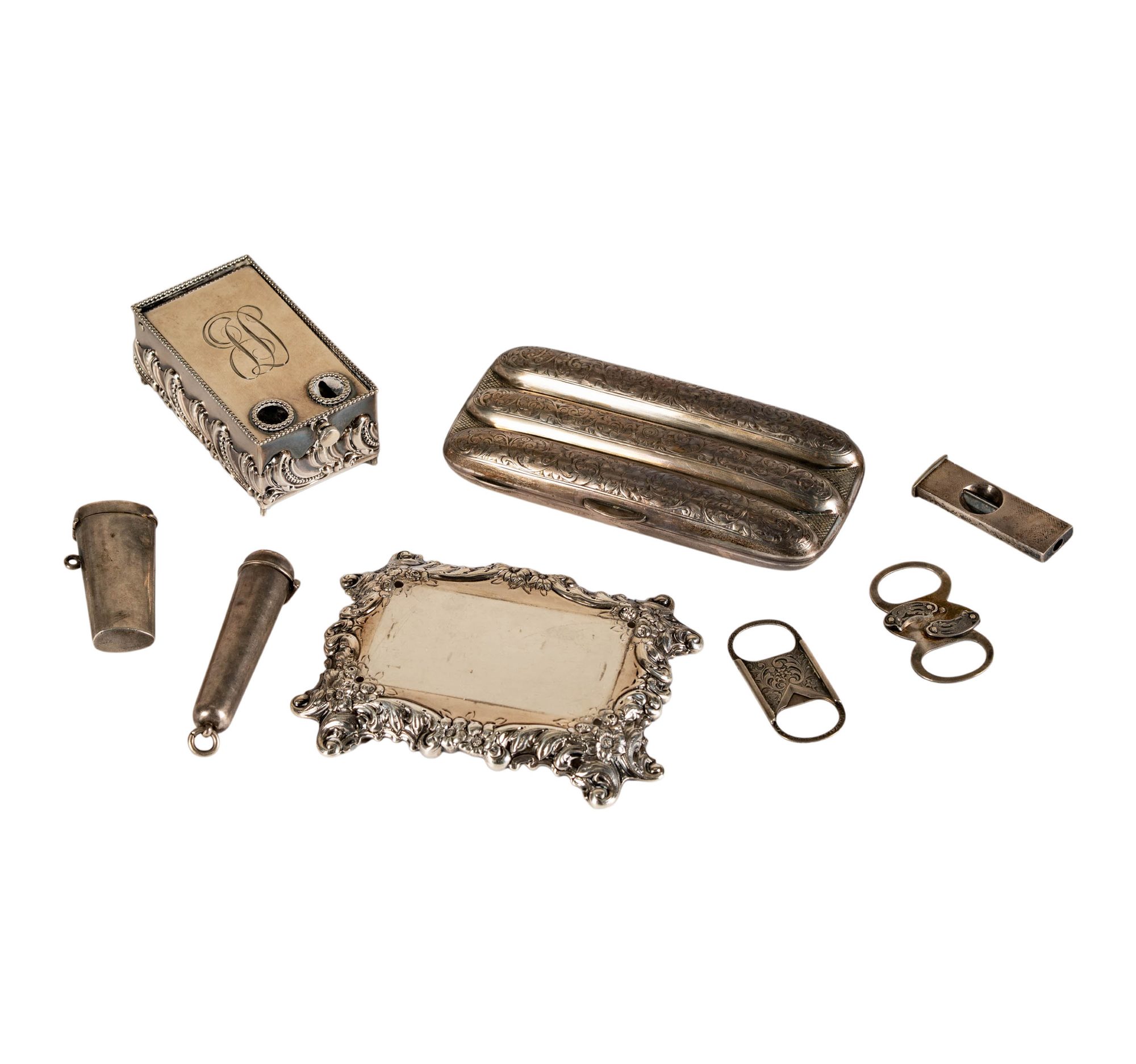 A Collection of Sterling Silver Smoking Accessories